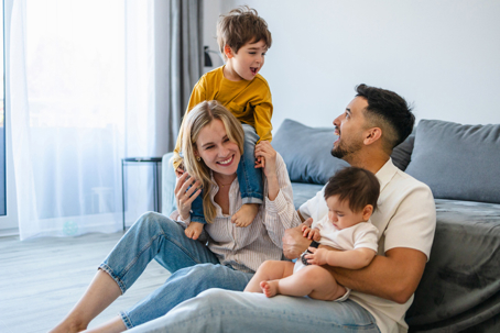 couple playing with children