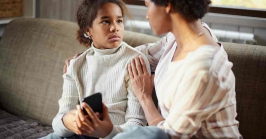 Parent talking to their child