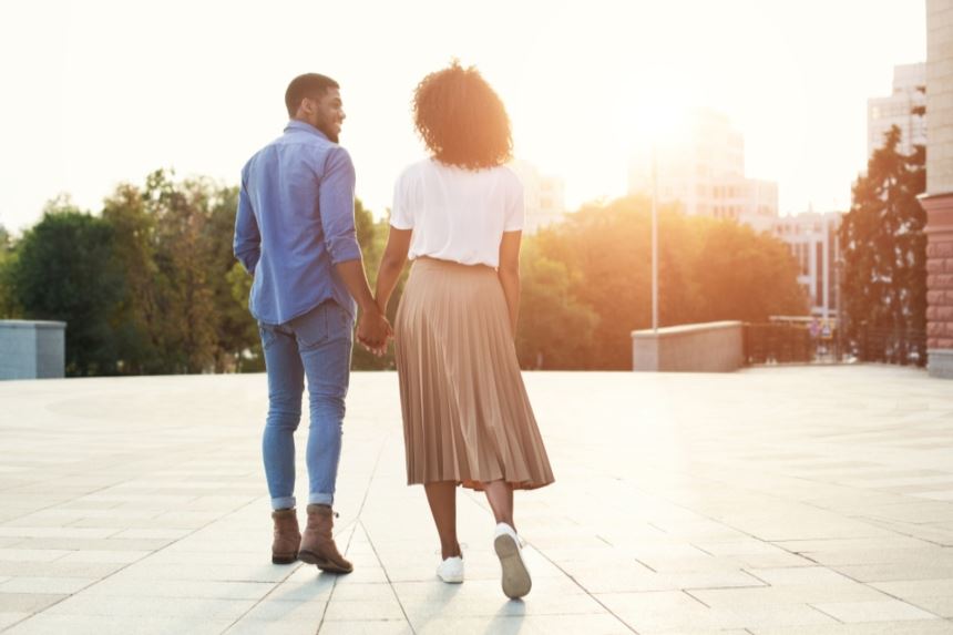 Couple holding hands