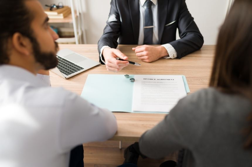 Couple looking over divorce papers