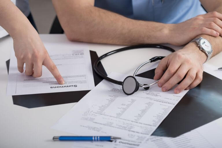 Summons paper in doctor's office